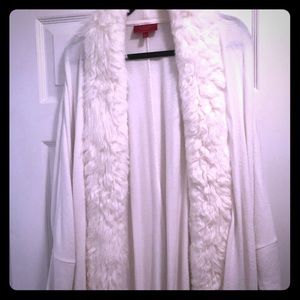 Jennifer Lopez FoFur white sweater